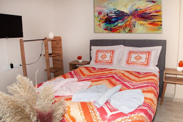 アザド・ホームズ・クムカピ54