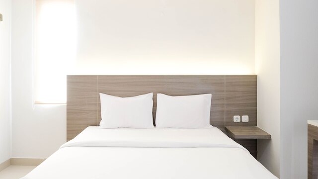 コージー リビング スタジオ アット タマン メラティ スラバヤ アパートメント