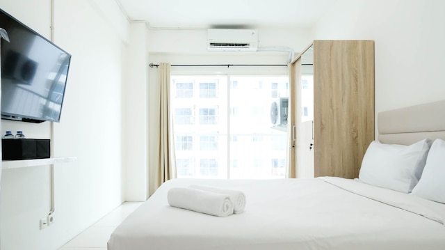 ホーミー アンド コンフィー スタジオ アット プンカャック ブキッ ゴルフ スラバヤ アパートメント