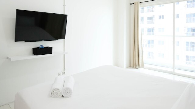 ホーミー アンド コンフィー スタジオ アット プンカャック ブキッ ゴルフ スラバヤ アパートメント