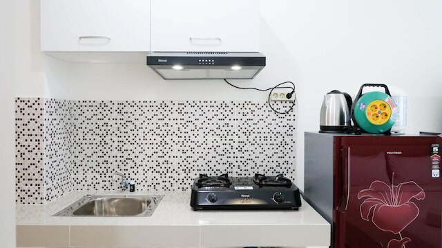 ホーミー アンド コンフィー スタジオ アット プンカャック ブキッ ゴルフ スラバヤ アパートメント