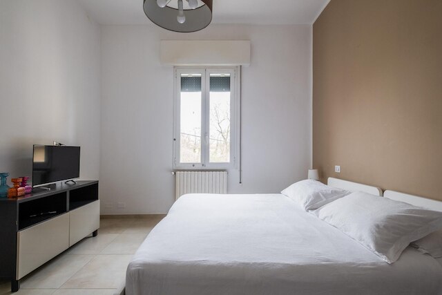 パラッツィーナ・カラッチ - アパルタメントサム