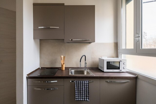 パラッツィーナ・カラッチ - アパルタメントサム