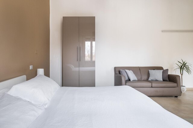 パラッツィーナ・カラッチ - アパルタメントサム