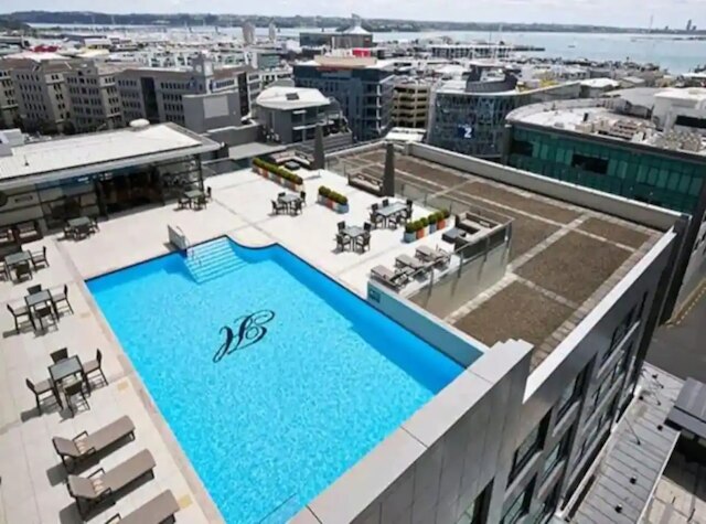 ラブリー ブライト アパートメント ウィズ プール アンド ジム by ゾディアック ステイズ