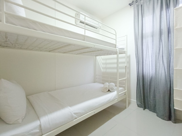 コンフォータブル アンド タィディ ベッBRム アット ヴィダ ビュー  アパートメント