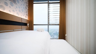 ホーミー アンド コージー リビング2 ベッドルーム アパートメント  アット アルヤドゥータ  レジデンス  スラバヤ