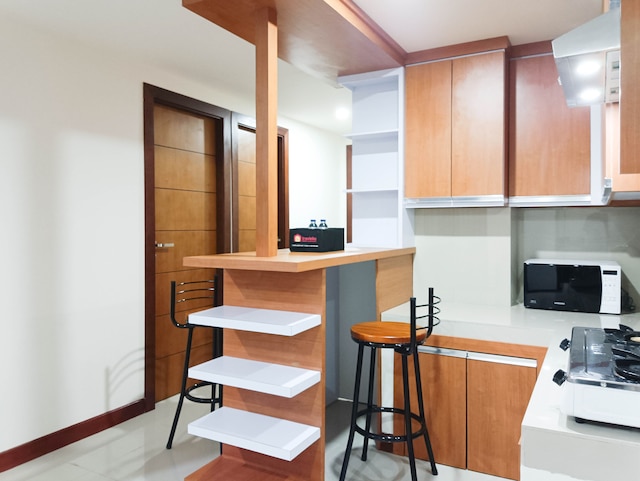 スペーシャス アンド コンフォータブル3ベッドルーム ヴィダ ビュー マカッサル アパートメント