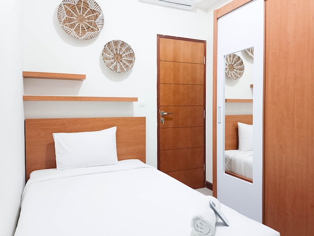 スペーシャス アンド コンフォータブル3ベッドルーム ヴィダ ビュー マカッサル アパートメント