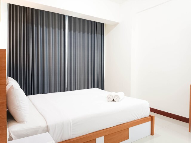 スペーシャス アンド コンフォータブル3ベッドルーム ヴィダ ビュー マカッサル アパートメント