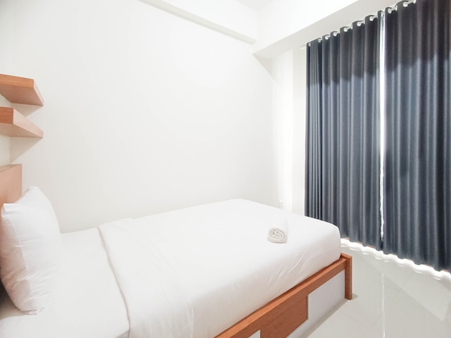 スペーシャス アンド コンフォータブル3ベッドルーム ヴィダ ビュー マカッサル アパートメント