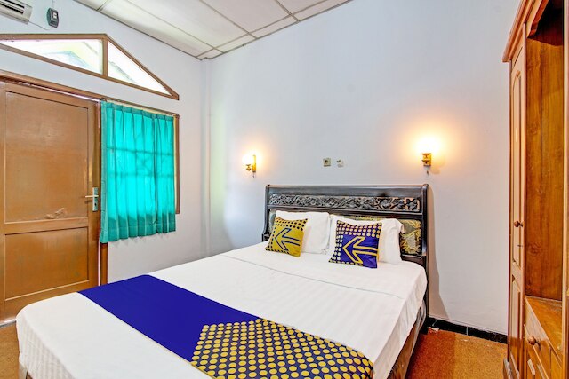 SPOT ON 91471シャリアウィスマウィンワリソンゴ