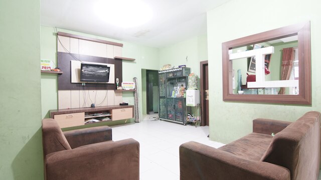 ホテル O ナイラ ホームステイ シャリア ニア コロコロ パナム, カラオケ, プール, & カフェ