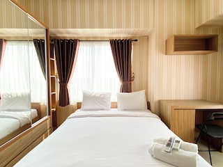 コージー ステイ スタジオ アット タマンサリ マホガニー カラワン アパートメント