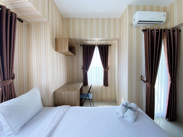 コージー ステイ スタジオ アット タマンサリ マホガニー カラワン アパートメント